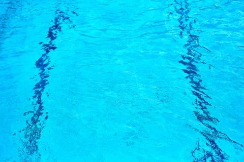 Blue surface of the pool water Stock Photos