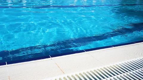 Blue surface water in the pool. Edge the pool. Video stock 110989170