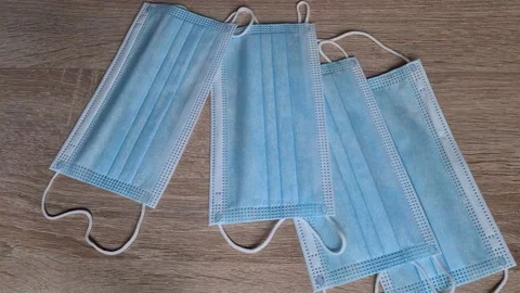 Blue Surgical Masks On Table Stock Footage 156041895