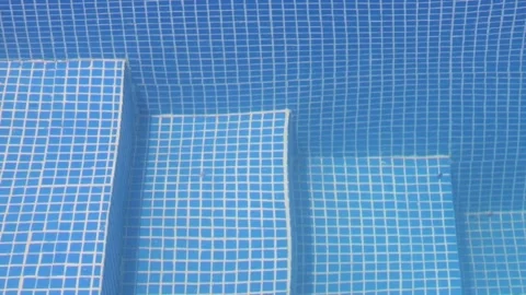 Blue swimming pool bottom texture background Stock Footage 130809218
