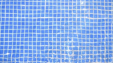 Blue swimming pool bottom texture background Stock Footage 130809566