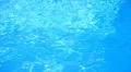 Blue swimming pool rippled water detail HD Footage