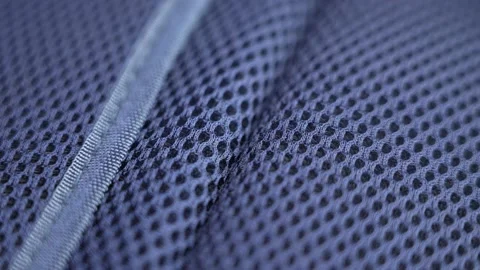 Blue synthetic nylon mesh surface with a smooth seam Stock Footage 220704374
