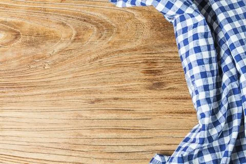 Blue table cloth on white background, copy space, top view. Stock Photos