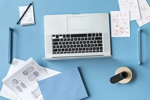 Blue table with laptop Foto stock