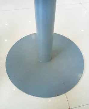 Blue table leg with round base Foto stock
