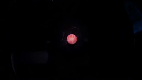 A blue tablet dissolves in water, forming a halo around, macro shot, time lapse Stock Footage 131185543