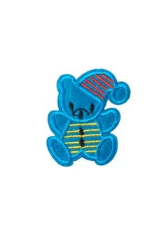 Blue Teddy bear with sleep cap, isolated on white background Stock Photos