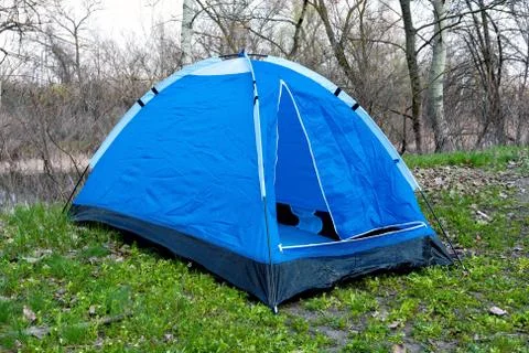 Blue tent in forest Stock Photos