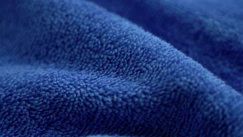 Blue terry towel fabric texture closeup Stock Footage 329891550