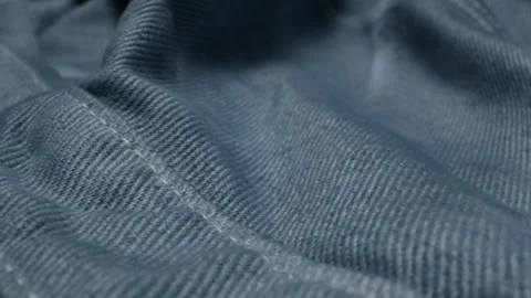 Blue textile jeans cloth texture close-up macro. Fashion fabric multicolor Stock Footage 284155245