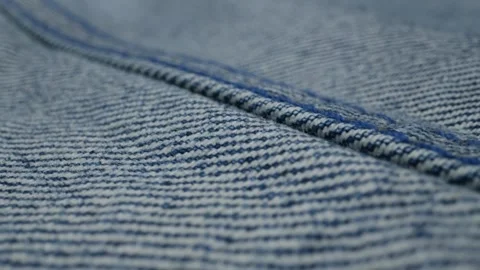 Blue textile jeans cloth texture close-up macro. Fashion fabric multicolor Stock Footage 285178291