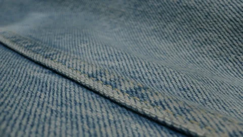 Blue textile jeans cloth texture close-up macro. Fashion fabric multicolor Stock Footage 285178536