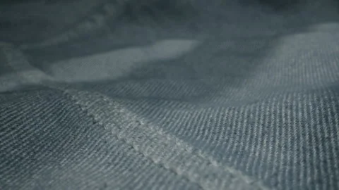 Blue textile jeans cloth texture close-up macro. Fashion fabric multicolor Stock Footage 288221582