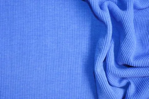 Blue textile pattern as a background. Blue material texture on fabric Stock Photos