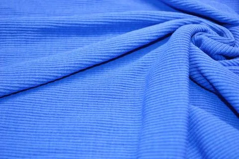 Blue textile pattern as a background. Blue material texture on fabric Stock Photos