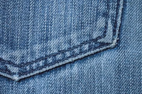 Blue texture background, jeans texture, fabric. Denim jeans background. Stock Photos