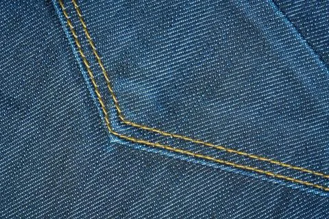 Blue texture background, jeans texture, fabric. Denim jeans background. Stock Photos