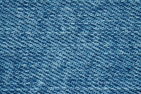 Blue texture background, jeans texture, fabric. Denim jeans background. Stock Photos