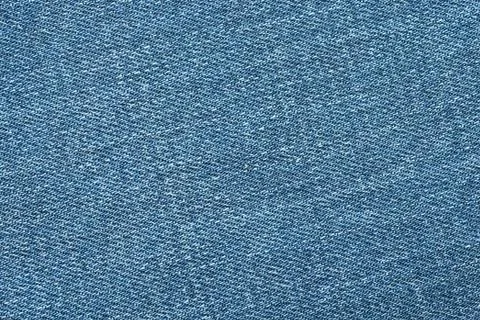 Blue texture background, jeans texture, fabric. Denim jeans background. Stock Photos