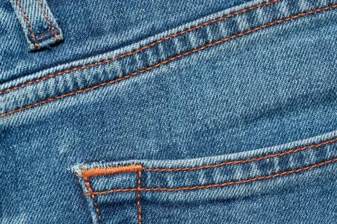 Blue texture background, jeans texture, fabric. Denim jeans background. Stock Photos