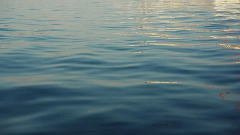 Blue texture water surface small waves slow motion move form ripples Stock Footage 238612076