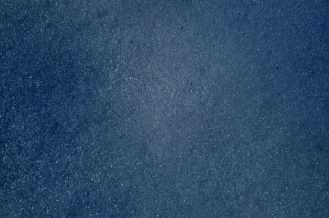 Blue textured abstract background with subtle sparkle Foto stock