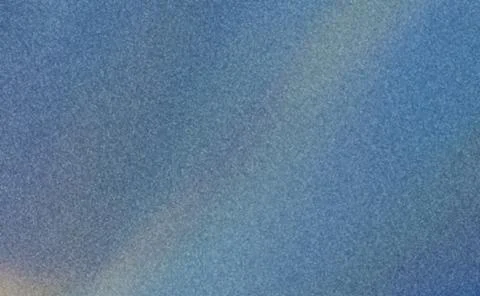 Blue textured background with a subtle gradient. The surface appears speckl.. Illustrazione stock