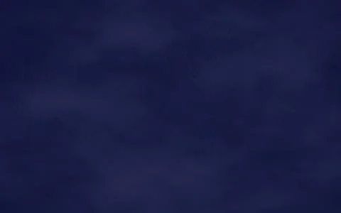 Blue textured background with subtle grunge effect mimicking fabric or paper  Illustrazione stock