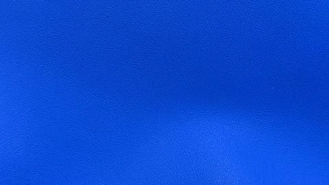 Blue textured background surface with subtle lighting gradients, Stock Photos
