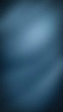 Blue textured grainy background vertical gradient design with blur and grun.. 스톡 사진