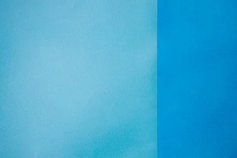 Blue textured paper background with gradient shades transitioning from ligh.. Stock Photos
