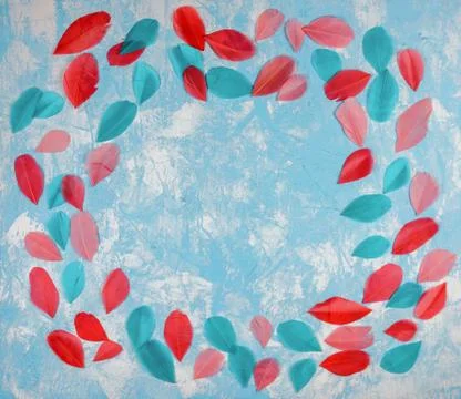 Blue textured square background with frame of colorful feathers. Stock Photos