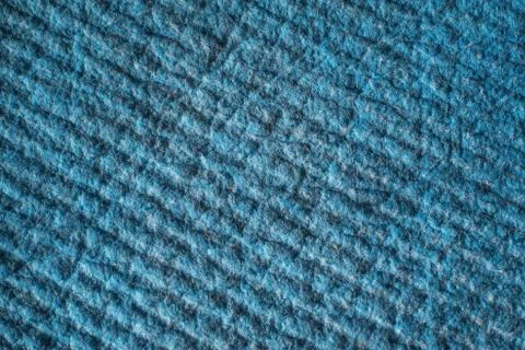 Blue textured tissue background. The pattern on the fabric surface. Stock Photos