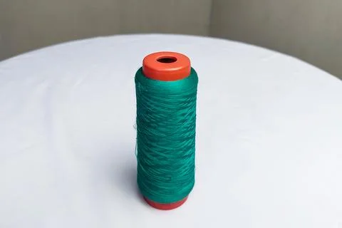Blue Thread on White Table Stock Photos