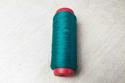 Blue Thread on White Table Stock Photos