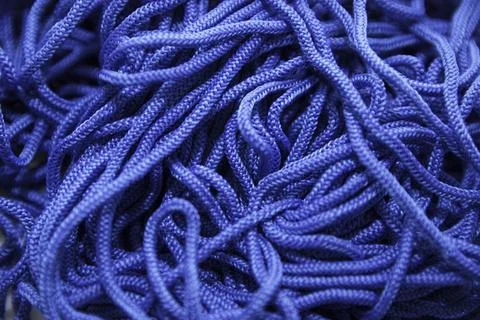 Blue threads on white background close-up Foto stock