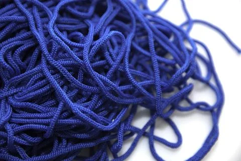 Blue threads on white background close-up Foto stock