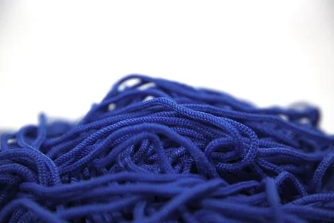Blue threads on white background close-up Stock Photos