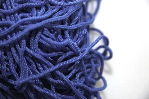 Blue threads on white background close-up Stock Photos