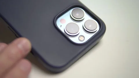 Blue three back side mobile photo camera lens. Close up slide movement Stock Footage 238080419