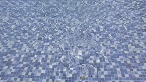 Blue tiles at the bottom of the wavy pool Stock Footage 218229206