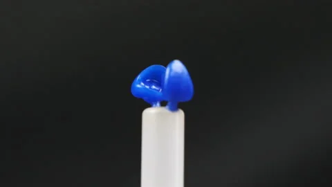 Blue tooth models rotate. Slow motion. Stock Footage 183953351