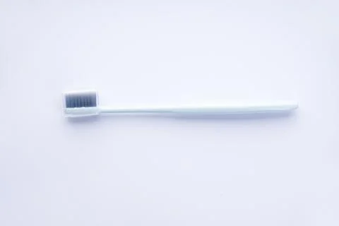 Blue toothbrush in a case on a white background. Isolated. Stock Photos