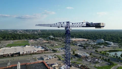 Blue Tower Crane on Construction site in suburban Kansas. Stock Footage 247943010