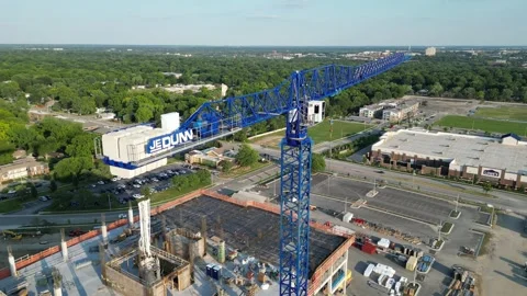 Blue Tower Crane on Construction site in suburban Kansas. Stock Footage 247943109