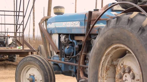 Blue Tractor Driving Away Stock Footage 236606140