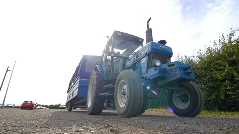 Blue tractor moving forwards Stock Footage 84479700