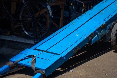 A blue trailer separating light and darkness Stock Photos
