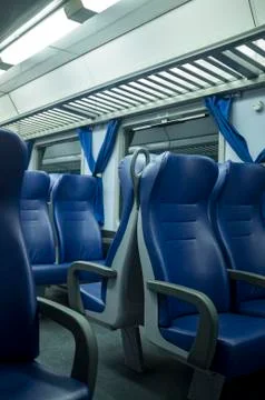Blue train seats in train Stock Photos